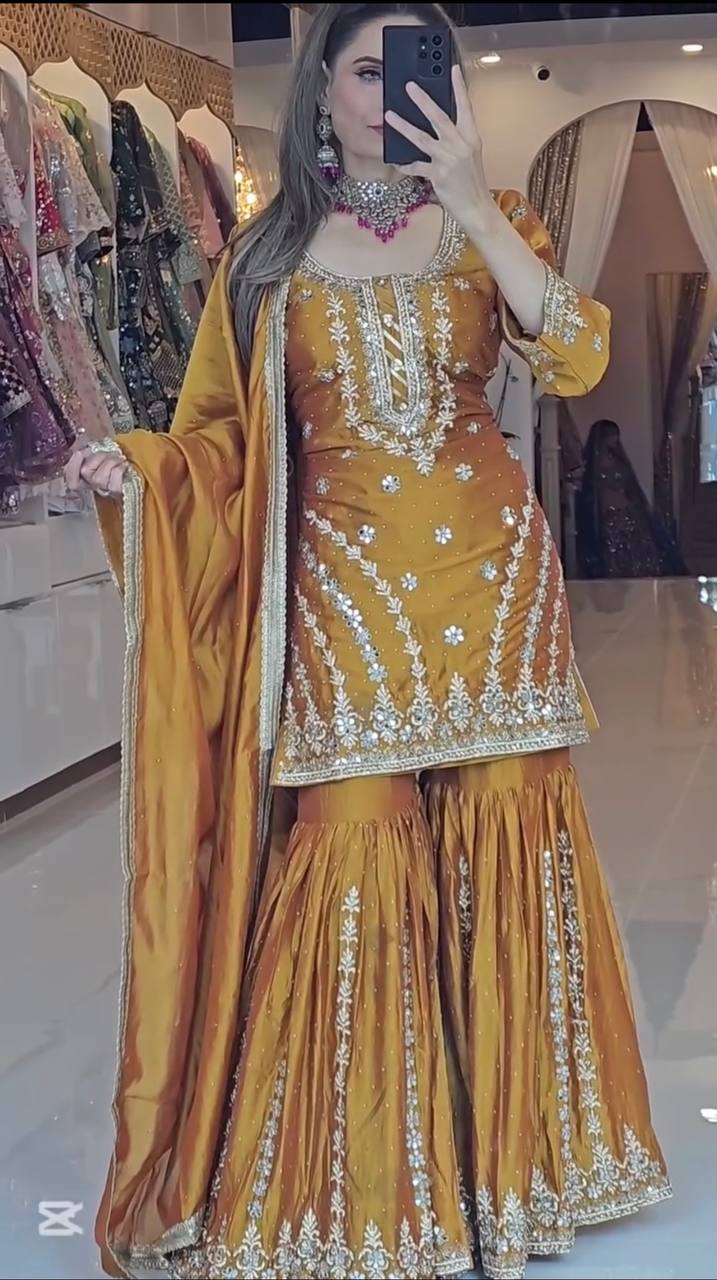 A Joyful Glow in a Stylish Pattern  Enjoy in Style with a Sharara Suit