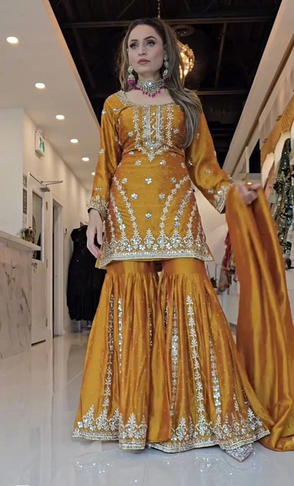 A Joyful Glow in a Stylish Pattern  Enjoy in Style with a Sharara Suit