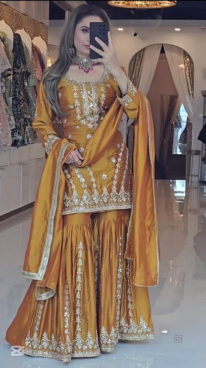 A Joyful Glow in a Stylish Pattern  Enjoy in Style with a Sharara Suit