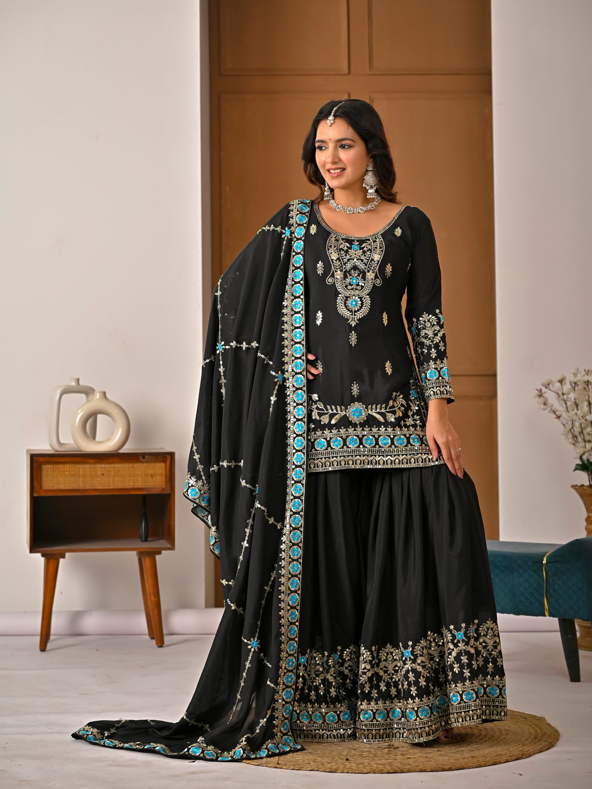 Black embroidered kurta sharara set with dupatta front view for wedding and festive wear