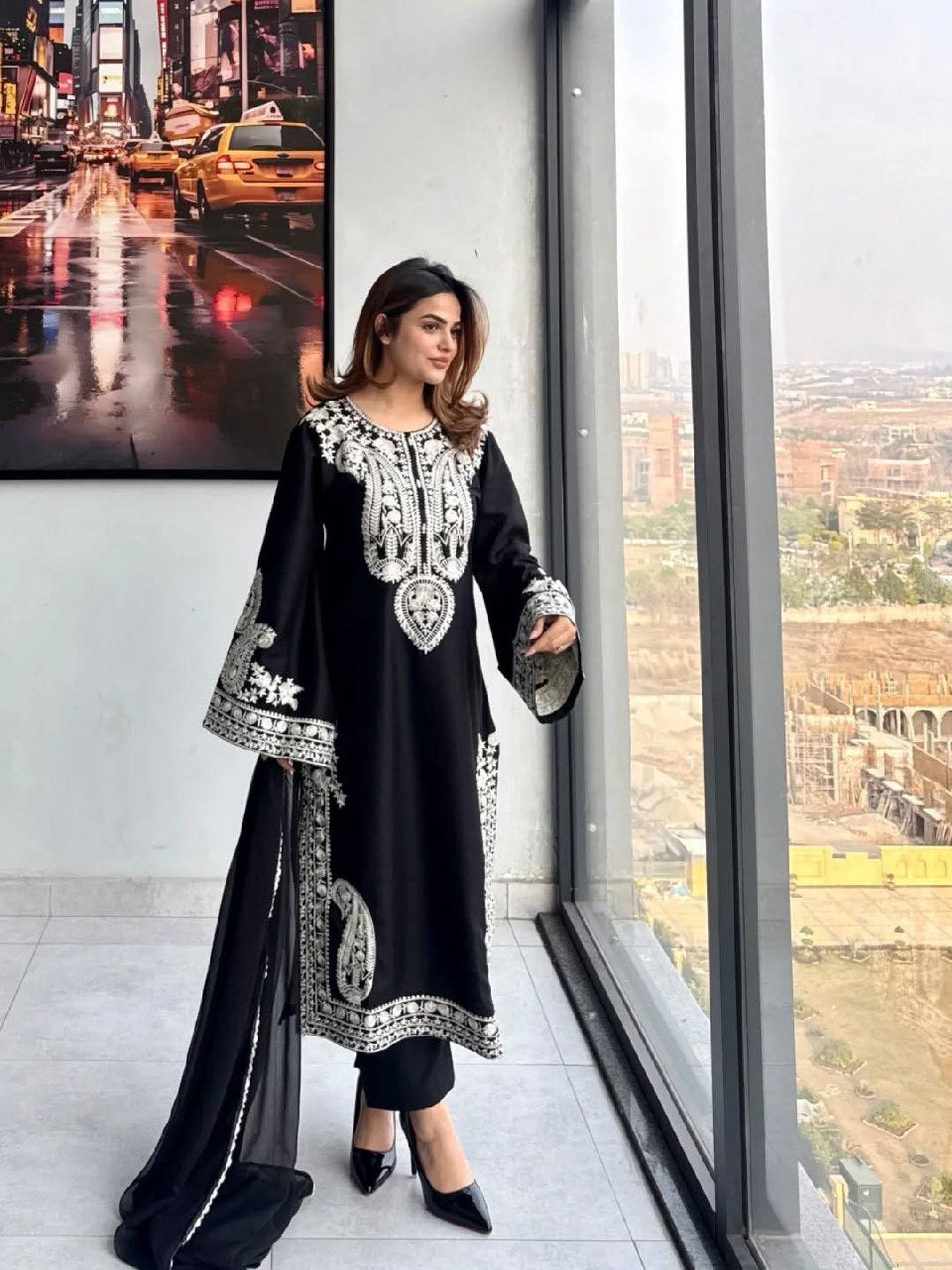 Fancy bell sleeves design on black organza silk kurta set