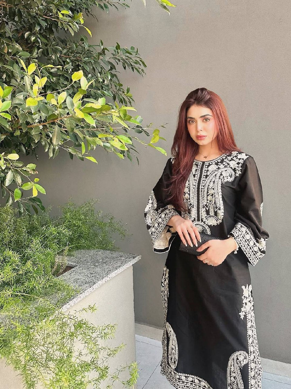 Front view of black organza silk embroidered kurta plazzo set with dupatta