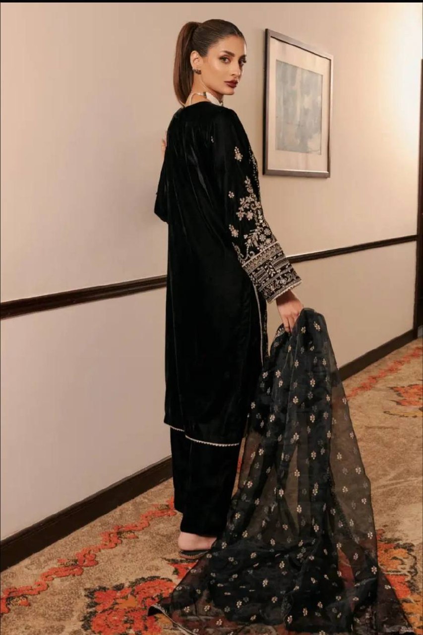 Back view of black Korean satin silk suit featuring intricate embroidery