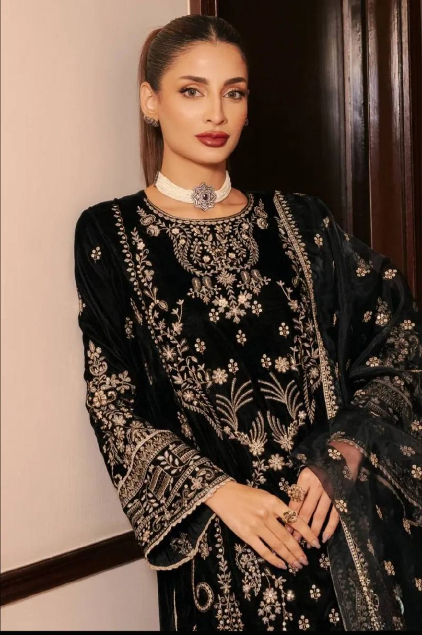 Designer black embroidered suit set side pose with tabby organza dupatta