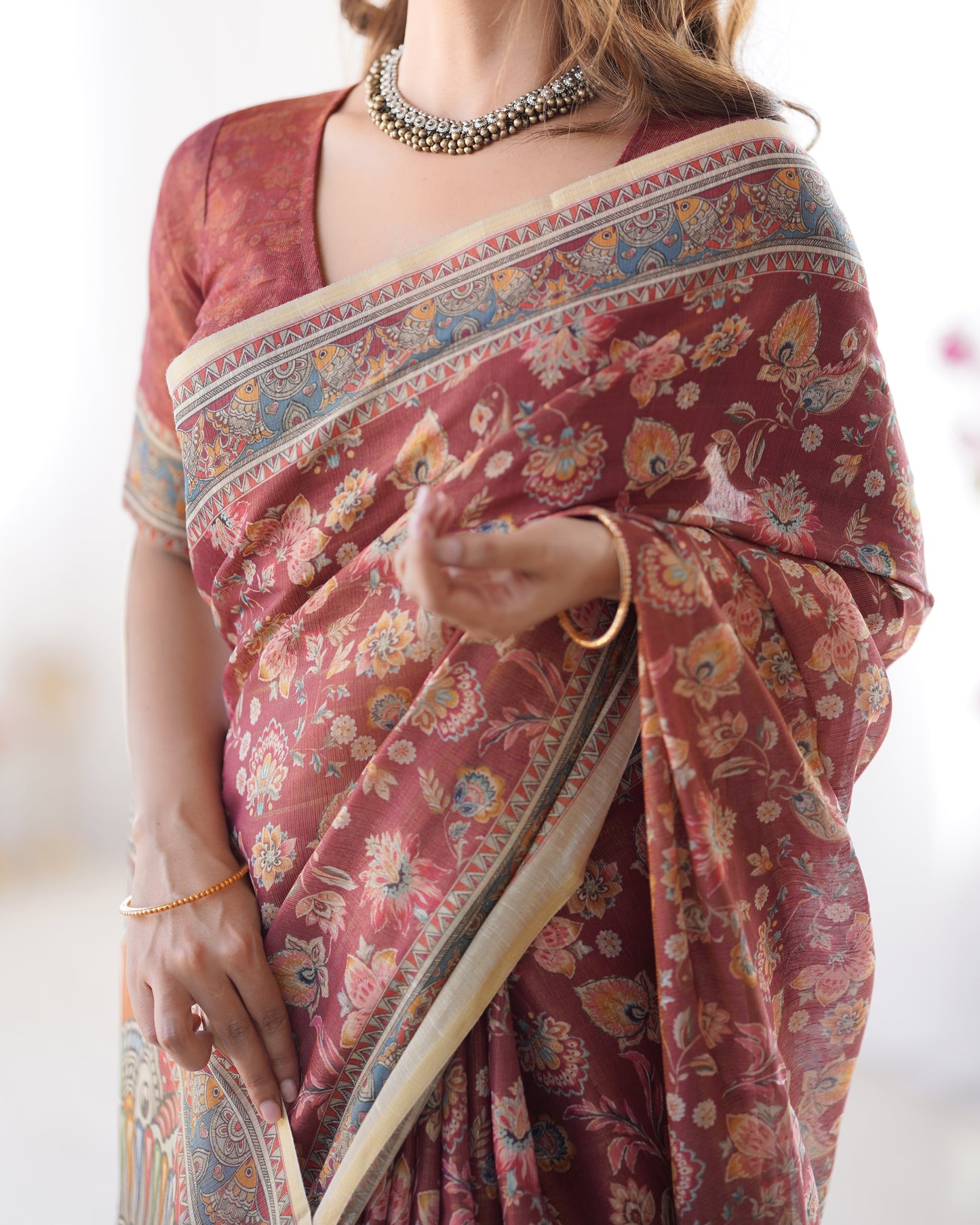 Elegant Rust Maroon Printed Cotton Saree with Artistic Heritage Pallu and Tassels