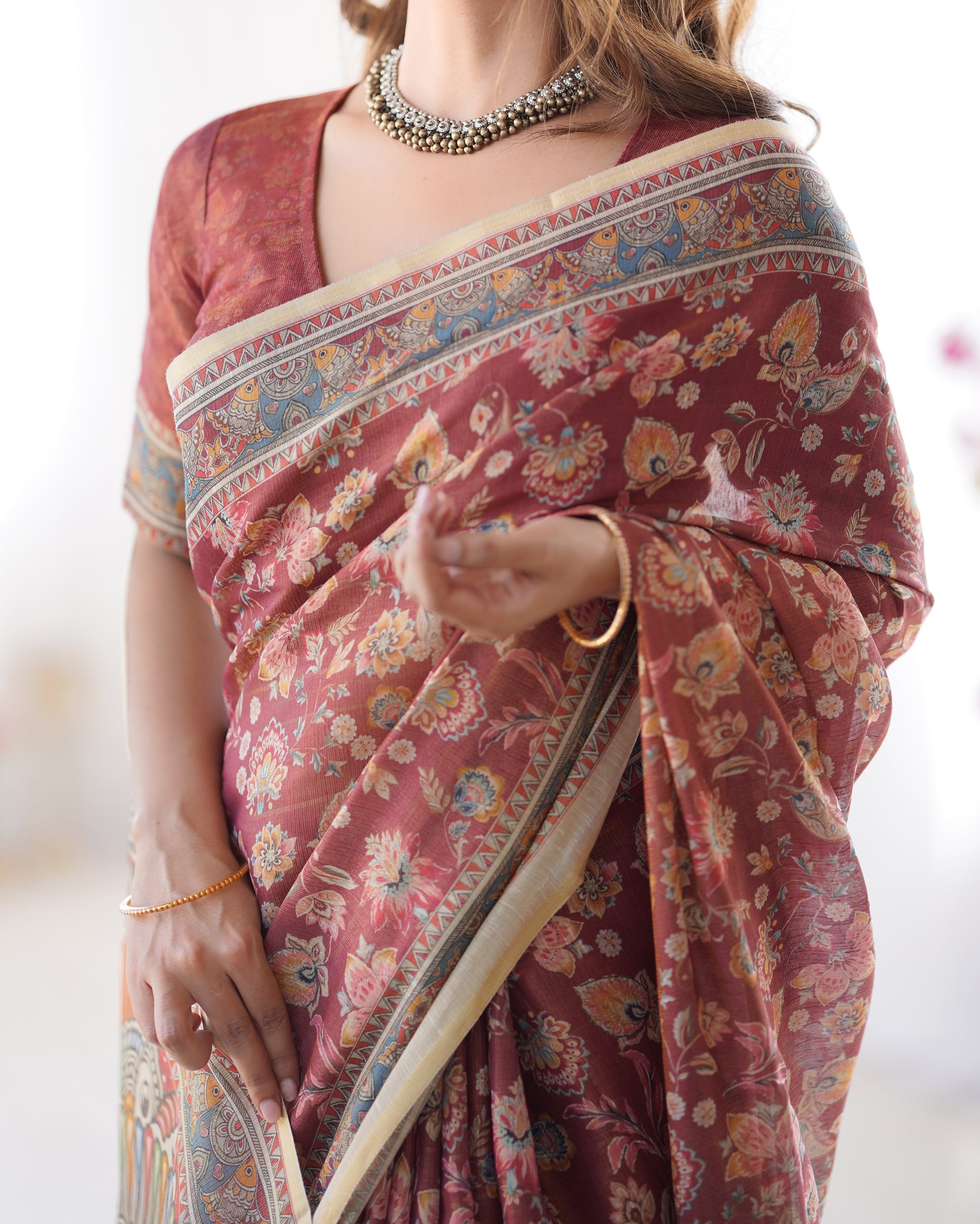 Elegant Rust Maroon Printed Cotton Saree with Artistic Heritage Pallu and Tassels