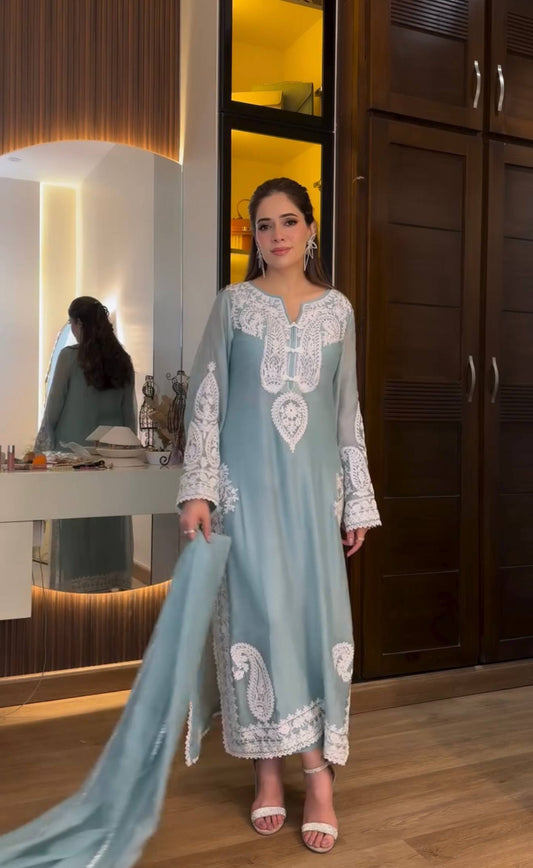 Front view of embroidered organza silk kurta plazzo set with dupatta for festive wear