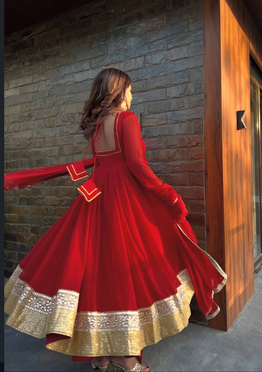 Traditional red anarkali suit with gold detailing festive outfit