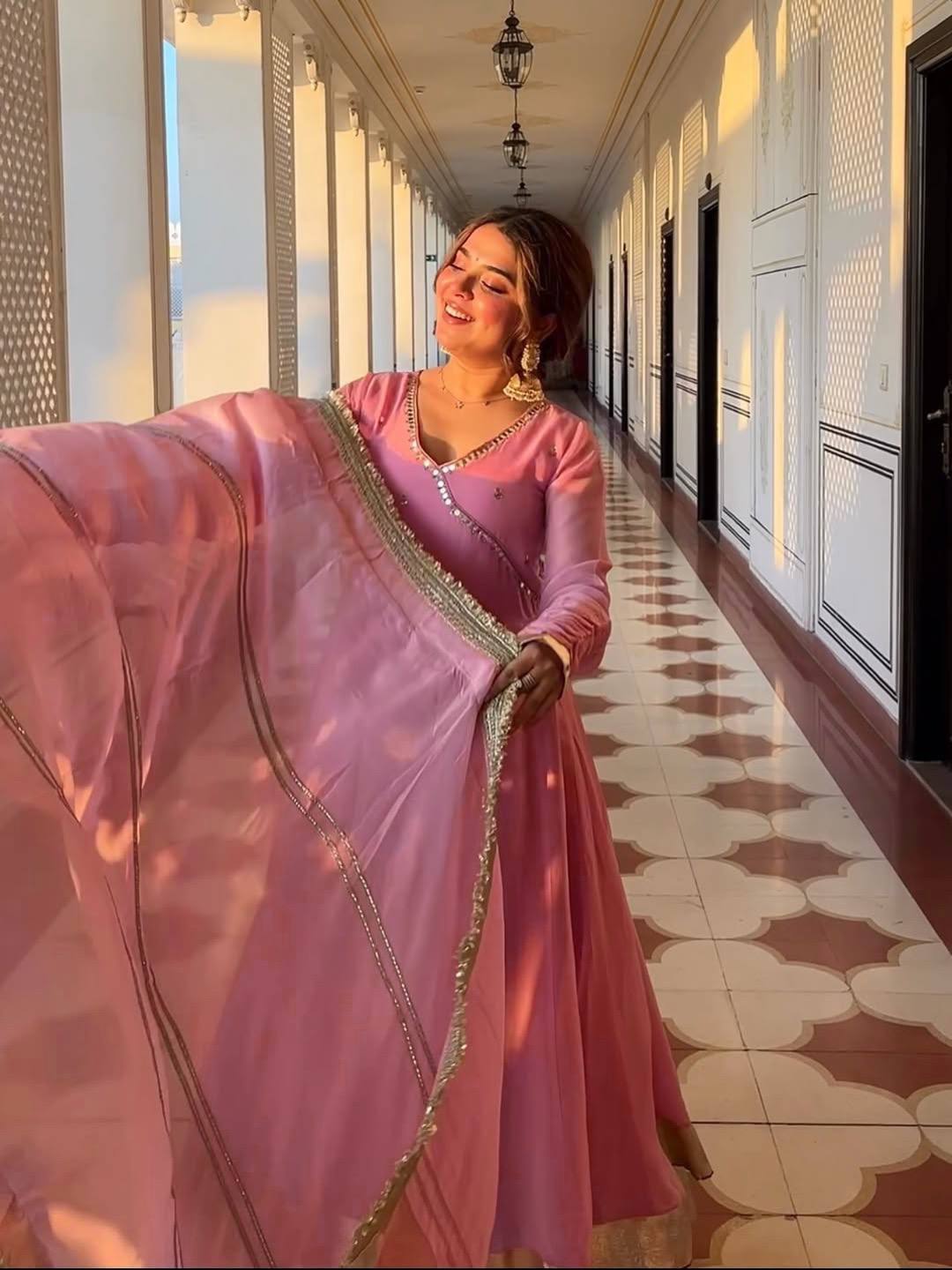 Embroidered organza Anarkali suit with 4 meter flair and full sleeves