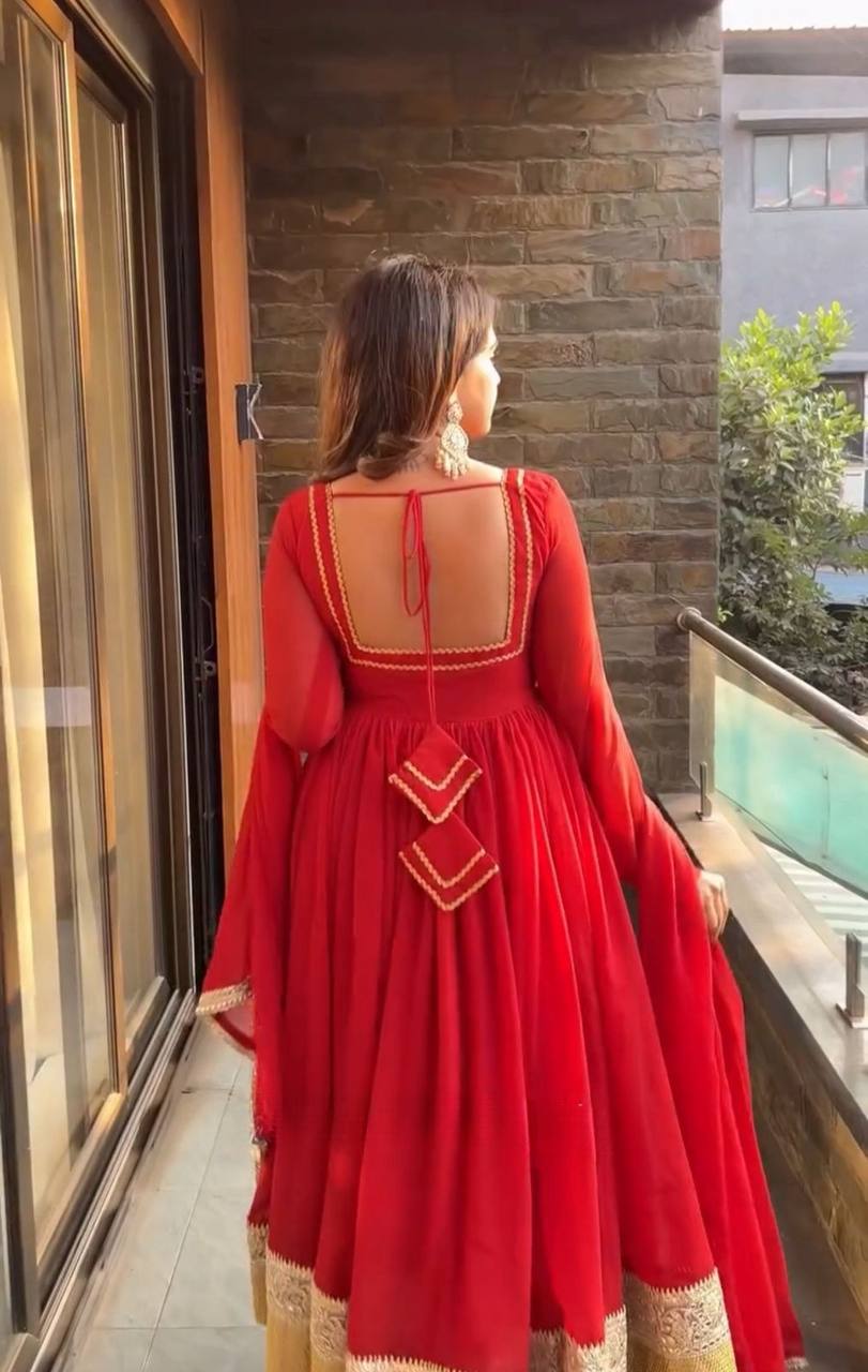 Traditional red anarkali suit with gold detailing festive outfit