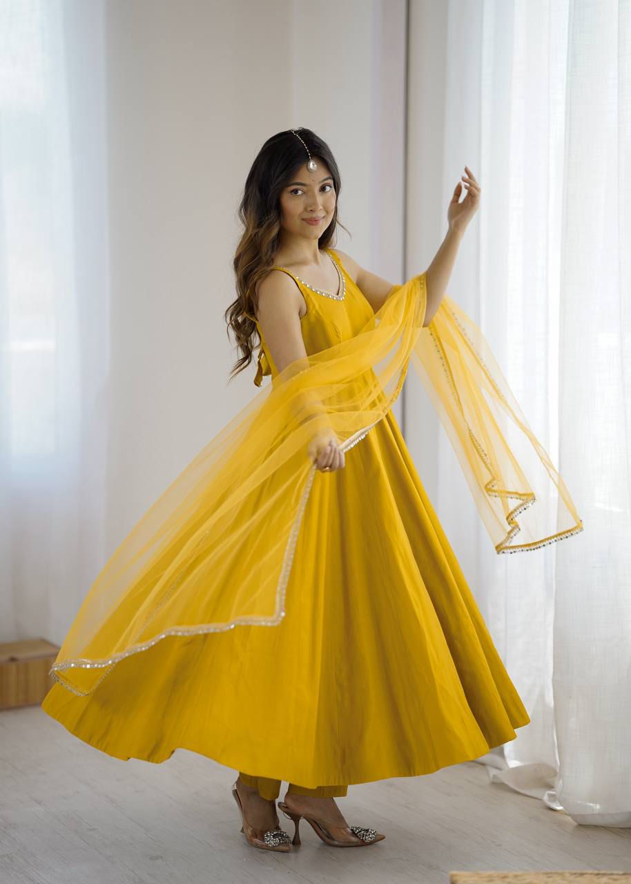 Mustard yellow Roman silk Chanderi Anarkali gown with heavy flare