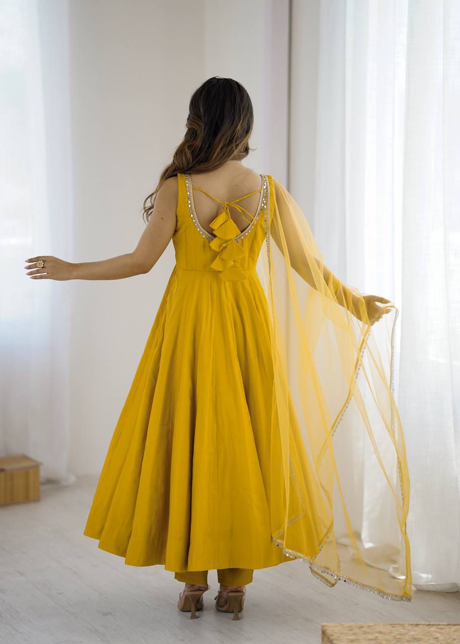 Back view of mustard yellow Anarkali suit with side zipper