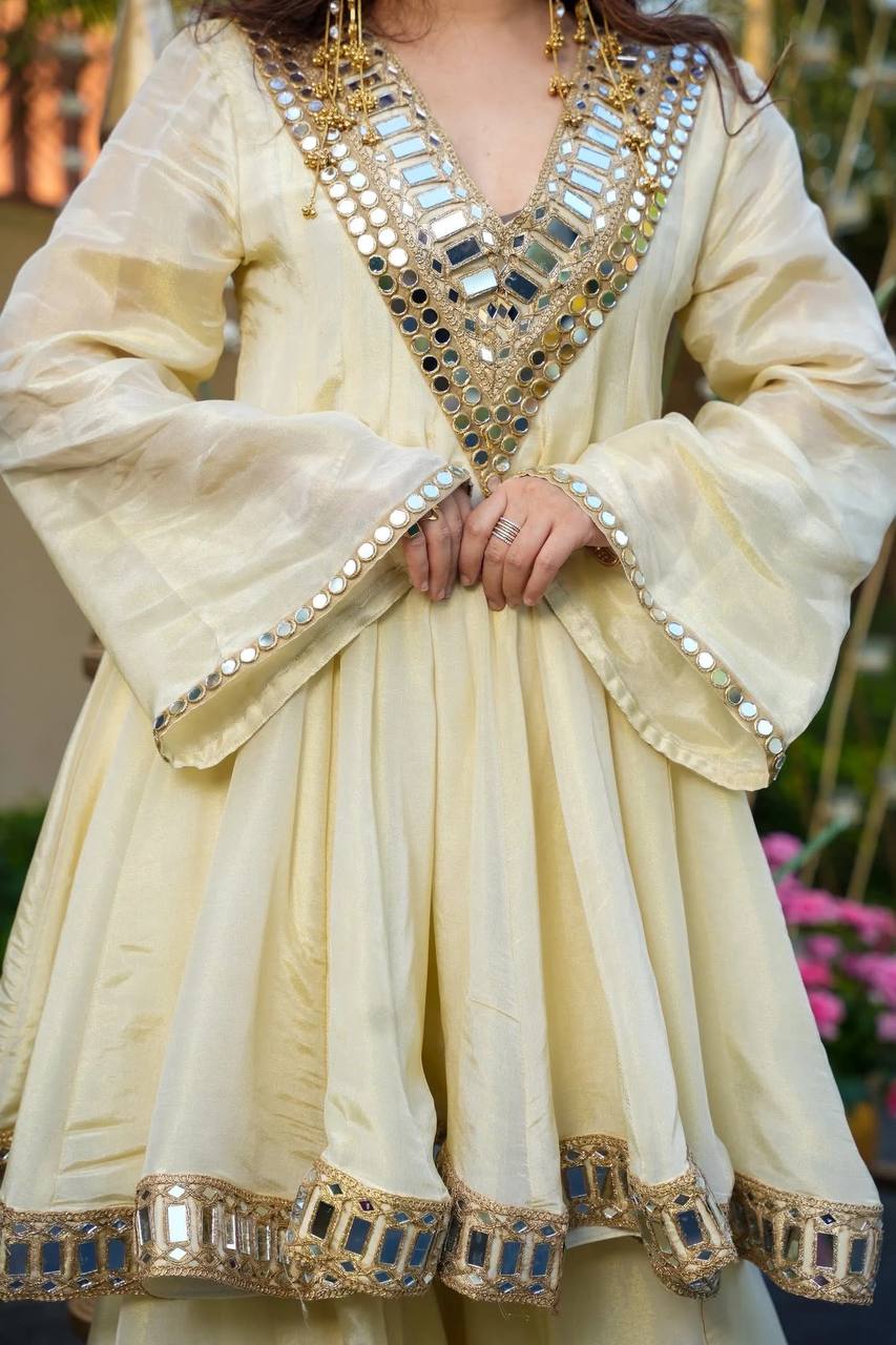 Indian festive wear gold sharara suit with full sleeves