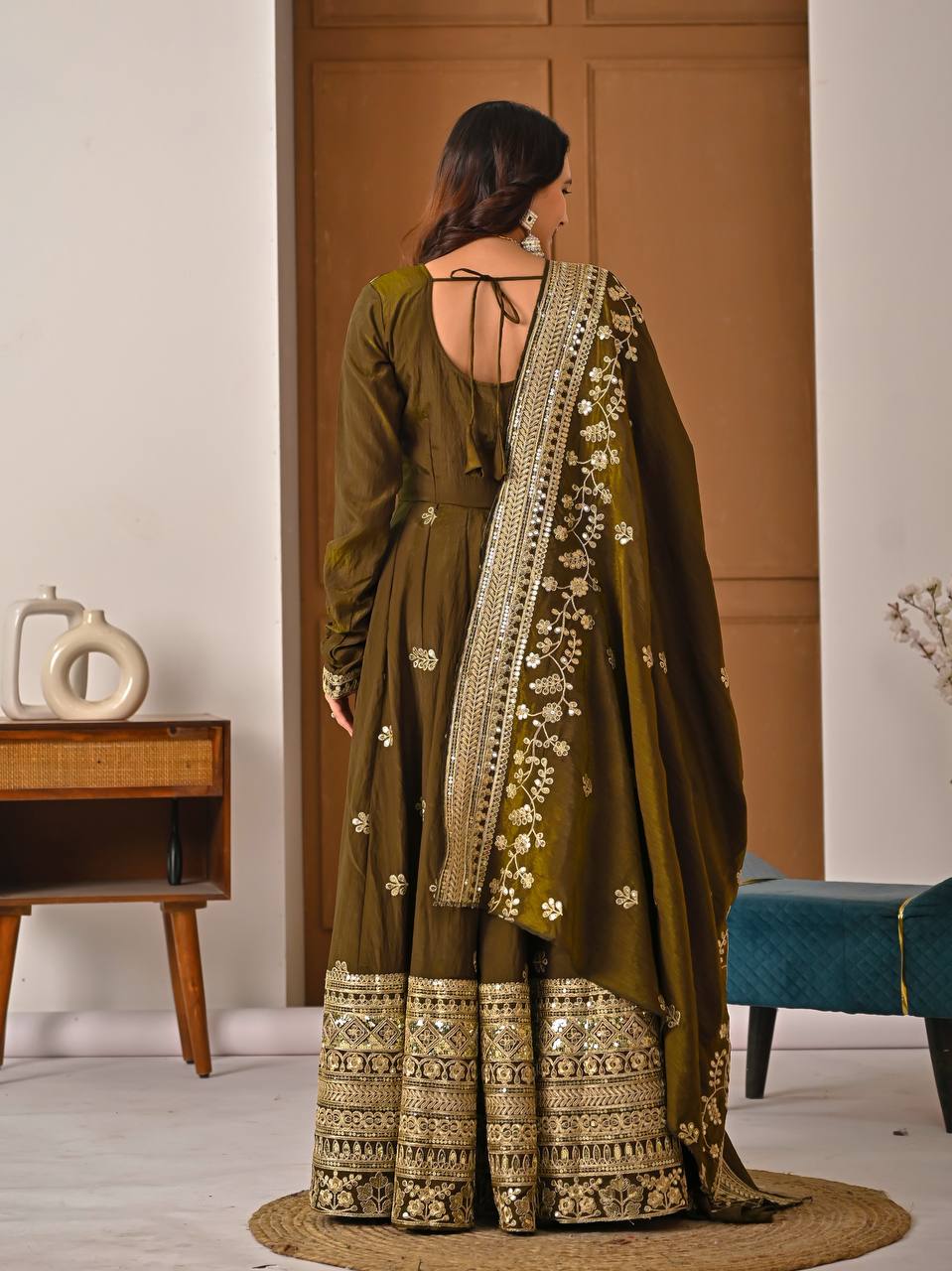 Designer olive green Anarkali suit for wedding and festive occasions with elegant finish