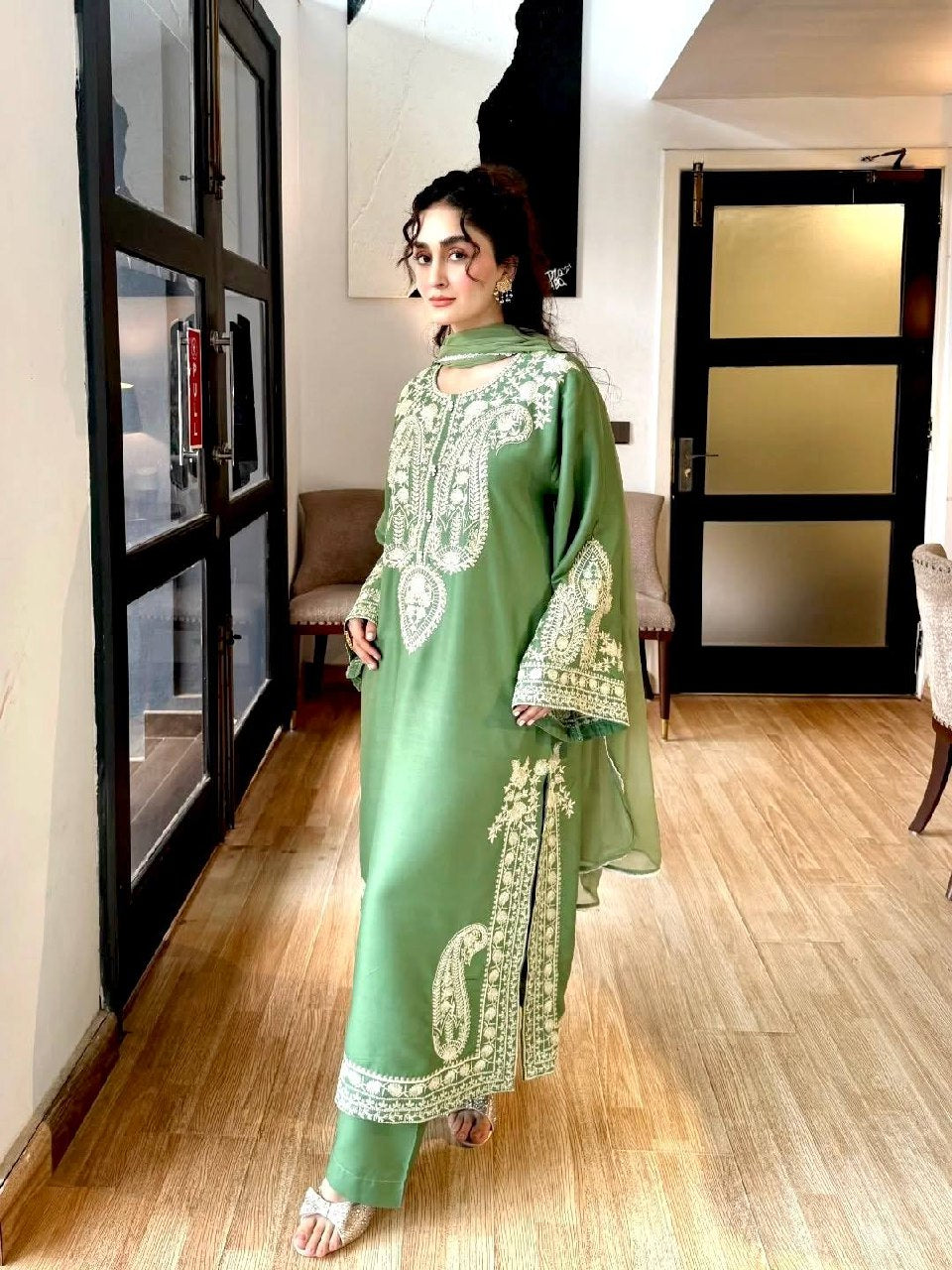 Back side design of parrot green embroidered kurta set