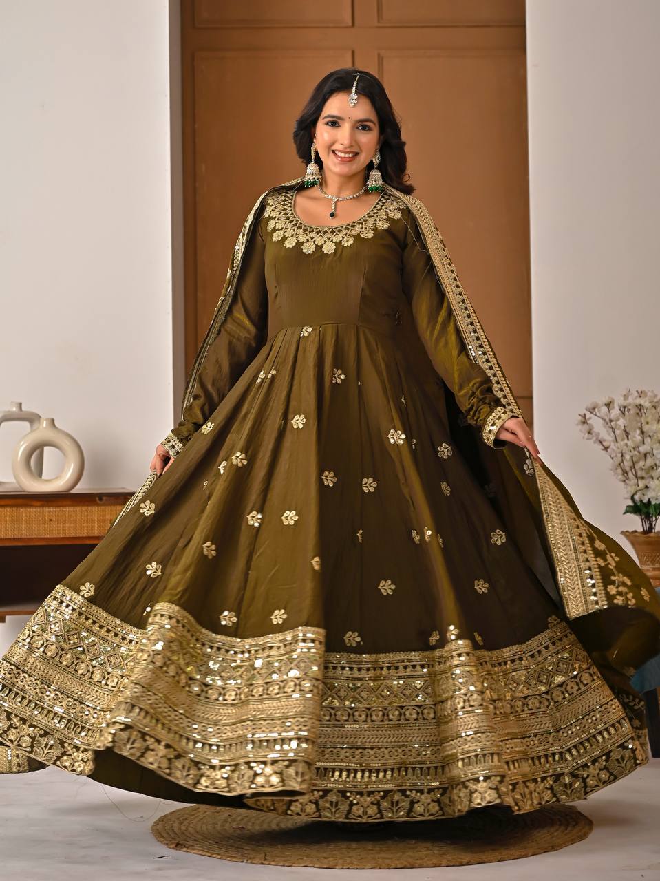 Olive green embroidered Anarkali suit with heavy golden border and dupatta – front view
