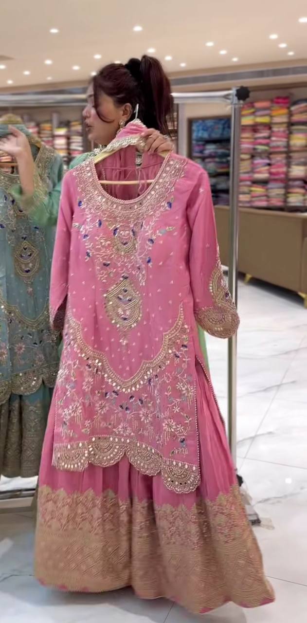 Heavy embroidered sleeve design of pink sharara suit for wedding and festive wear