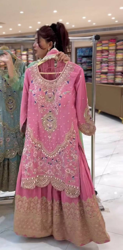 Heavy embroidered sleeve design of pink sharara suit for wedding and festive wear