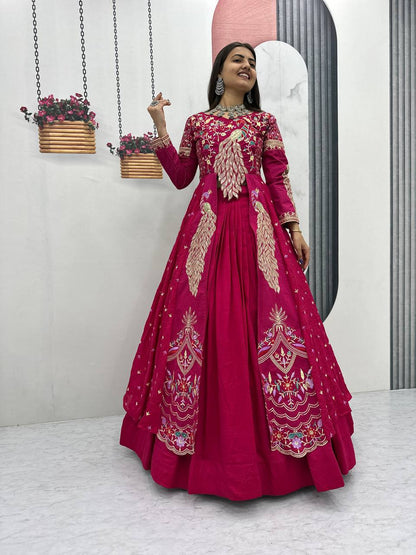 Close-up of heavy thread and sequence embroidery on pink Vichitra choli