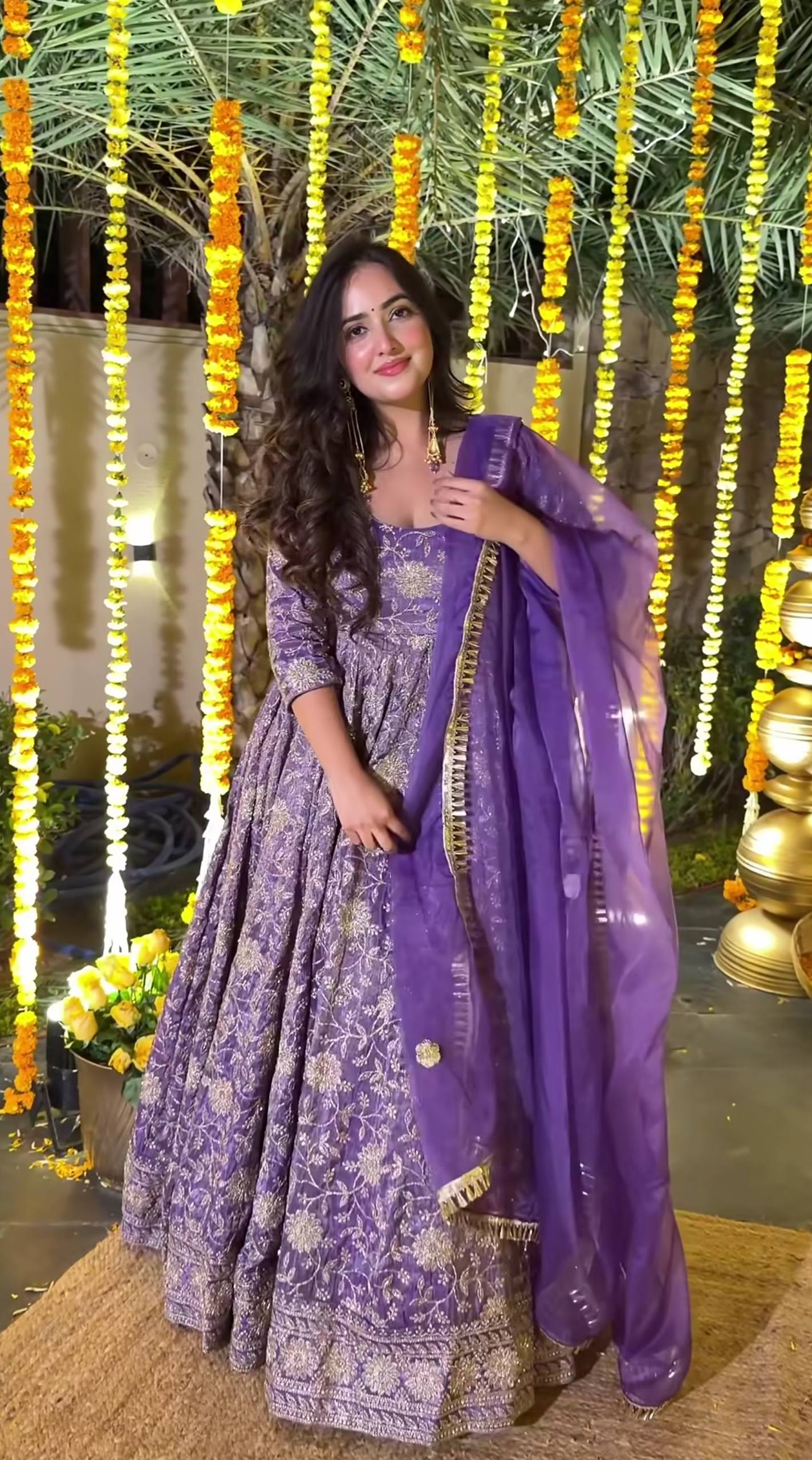 Purple embroidered Anarkali suit in heavy crunchy silk with full sleeves and sequence work front view
