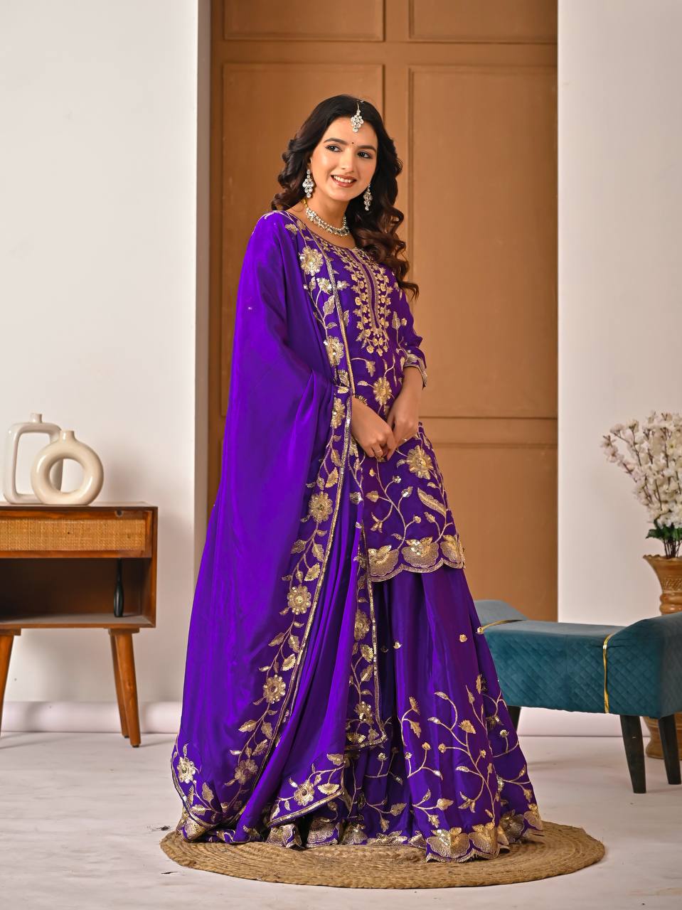 Purple party wear chinnon silk lehenga set with 3 meter flair and elegant sequence embroidery