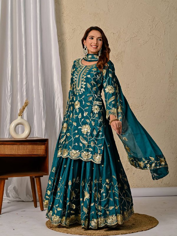 Rama green chinnon silk lehenga set showing heavy embroidery work and matching dupatta detail