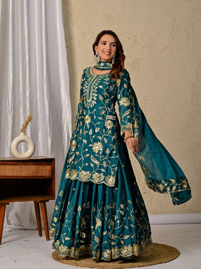 Rama green chinnon silk lehenga set showing heavy embroidery work and matching dupatta detail