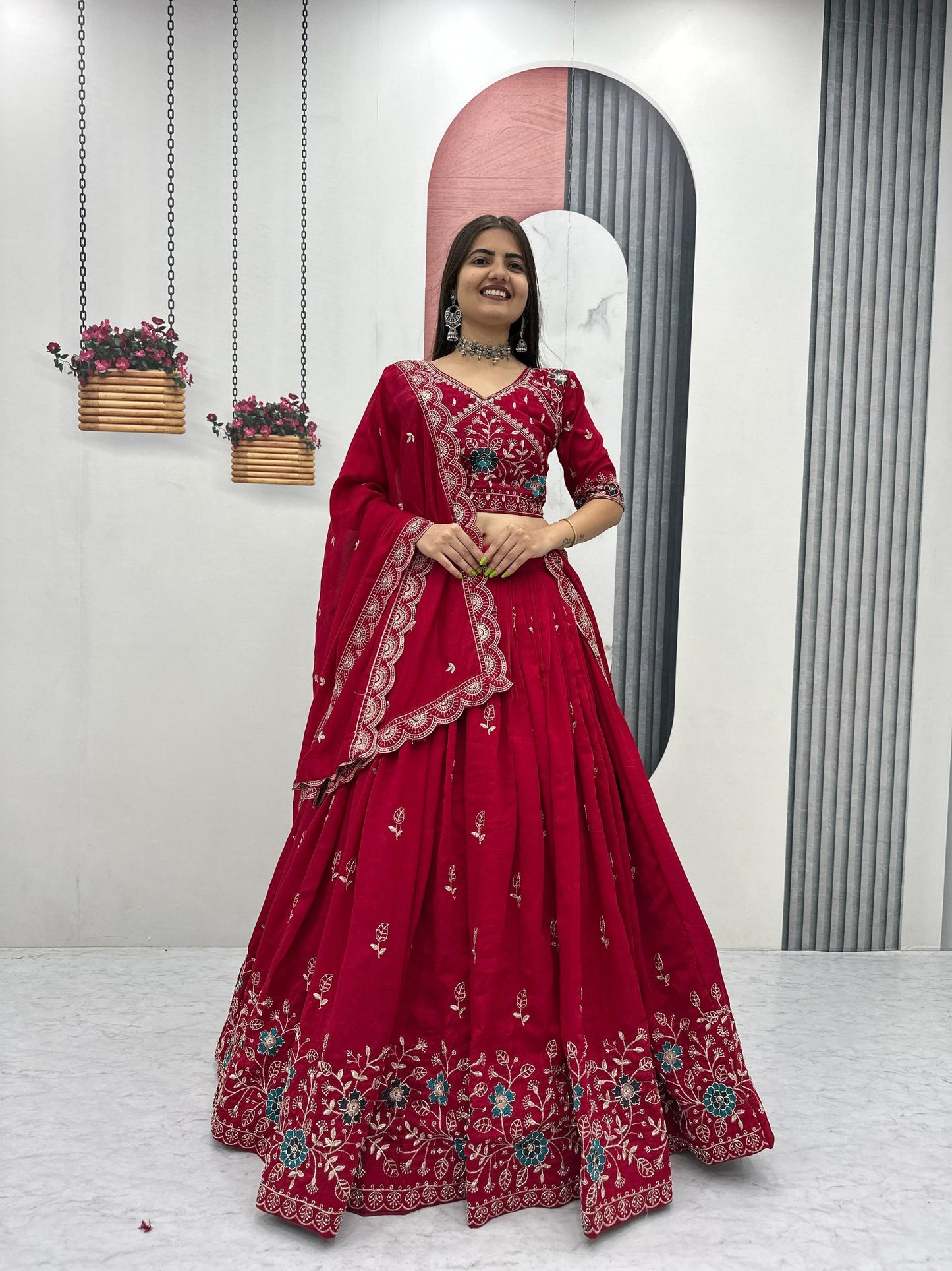 Red embroidered lehenga choli front view for wedding and festival wear