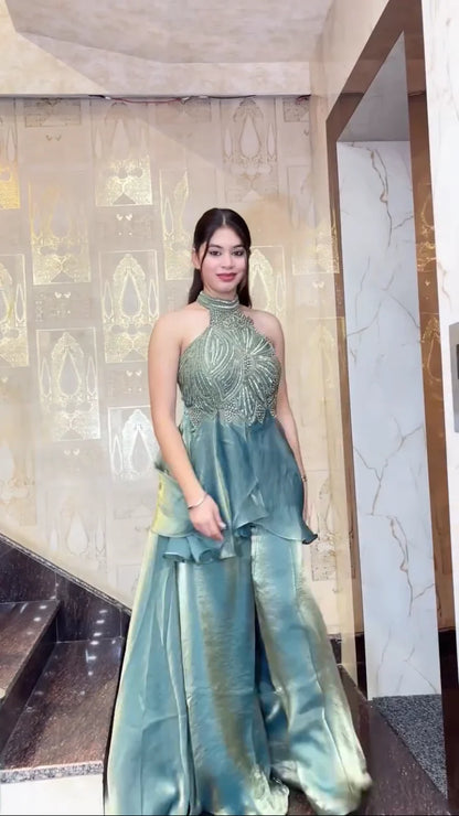 Women sea green designer sharara set side pose ethnic party wear