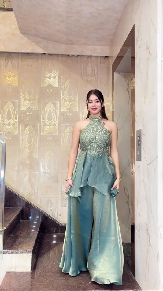 Sea green halter neck sharara set for women front view party wear outfit