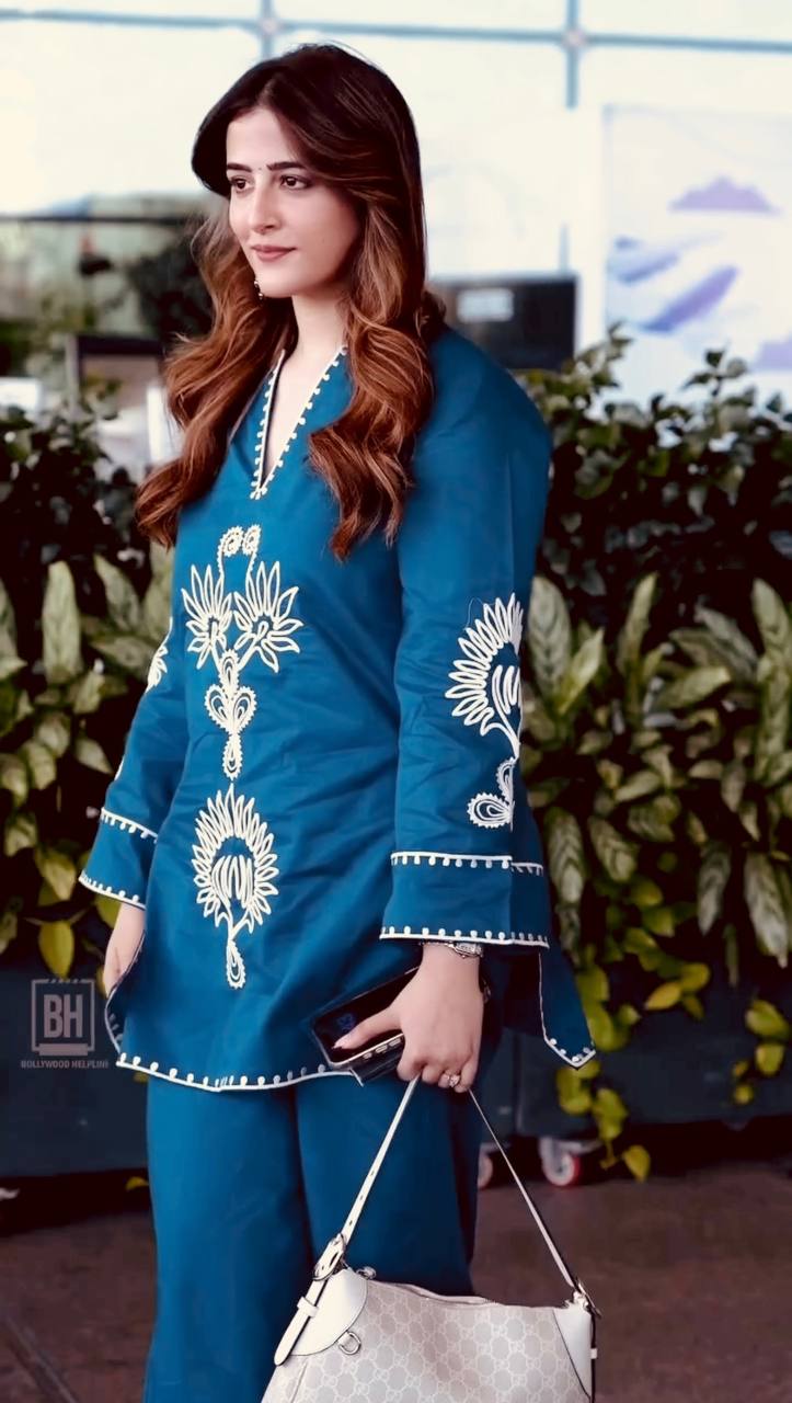 Women teal rayon embroidered kurta plazzo set front view stylish ethnic wear