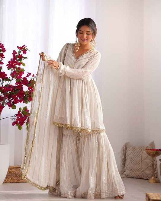 White and golden sharara suit for women front view with dupatta, elegant ethnic wear for festive and wedding occasions