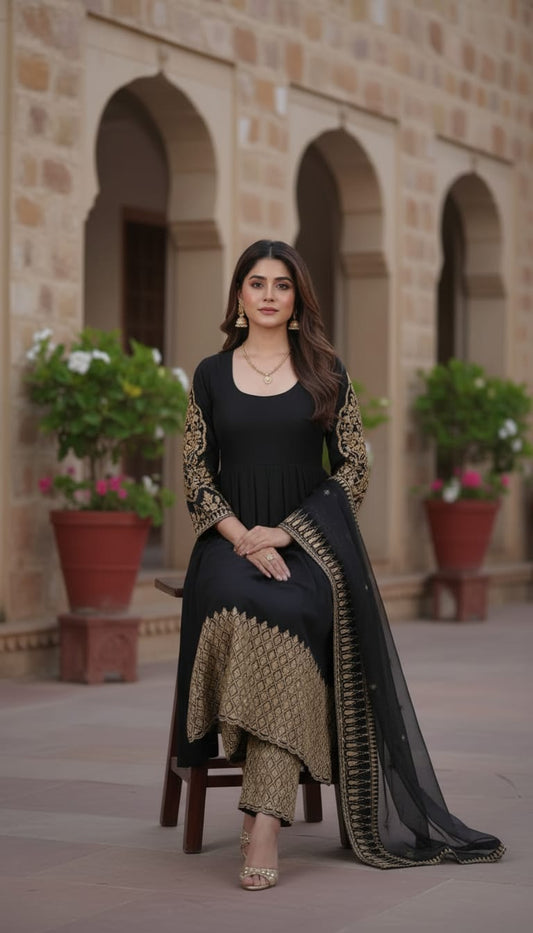 Women wearing black embroidered Anarkali suit with pant and heavy georgette dupatta